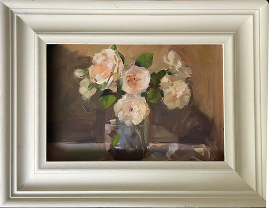 Garden roses in a jam jar