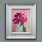 Clematis and geraniums in a green vase oil painting