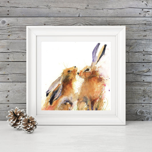snuggling hares by Jen Buckley