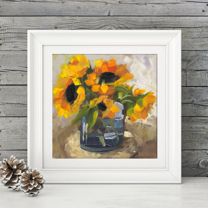 Sunflowers in a blue glass vase
